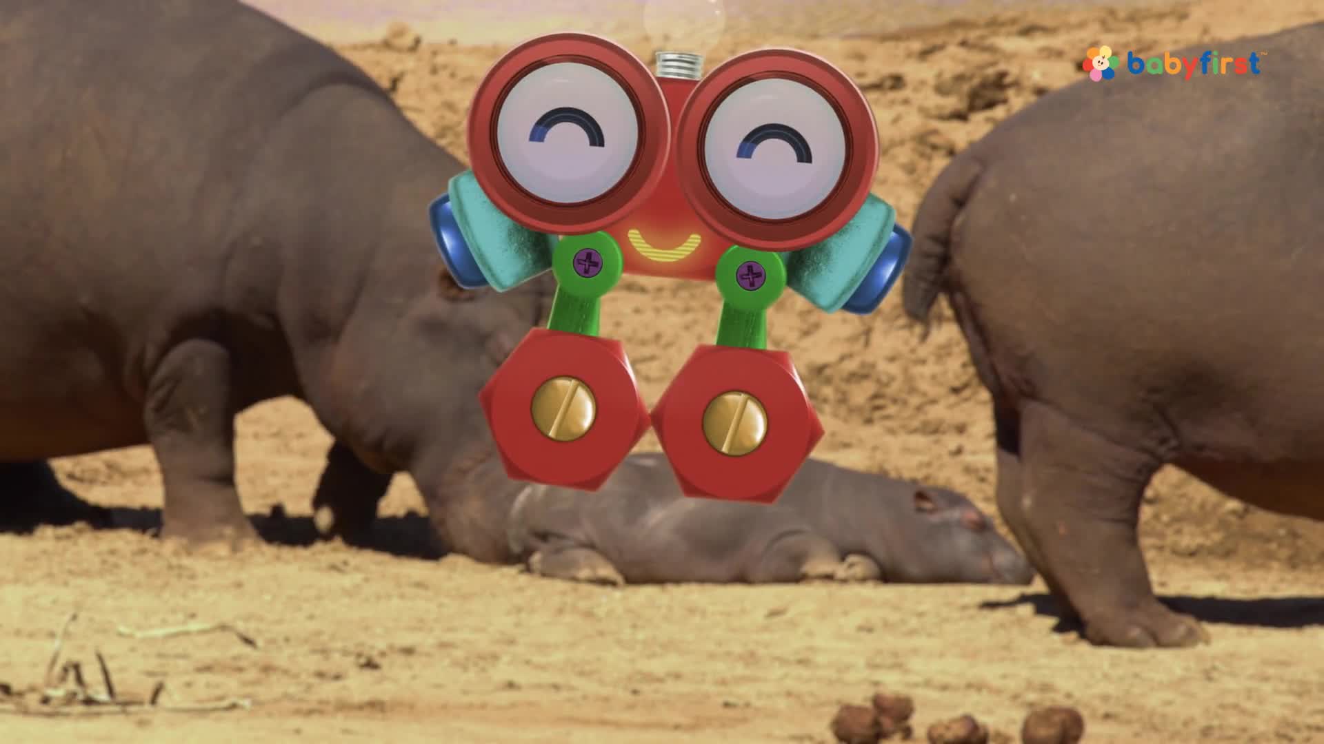 A cartoon robot with big eyes hovers in front of two hippos. One hippo is bending down, while a baby hippo rests on the ground.
