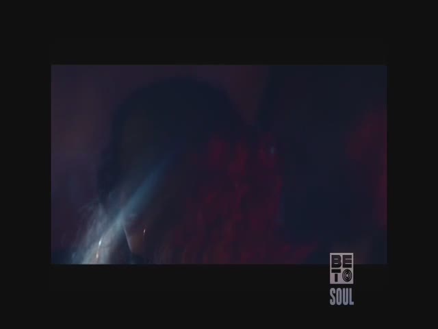 A figure is illuminated by a bright, angled light, their face partially obscured. The BET Soul logo sits in the bottom right corner.

