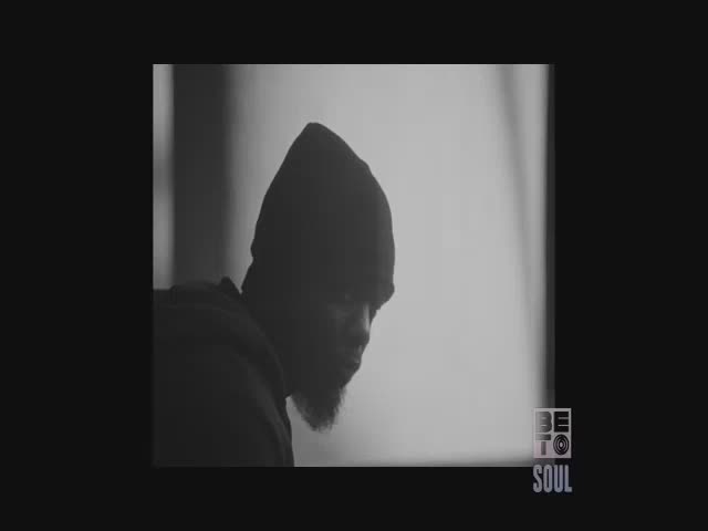A man in a dark hoodie and beanie is silhouetted against a bright background, his face partially obscured by shadow. The BET Soul logo is visible in the corner.
