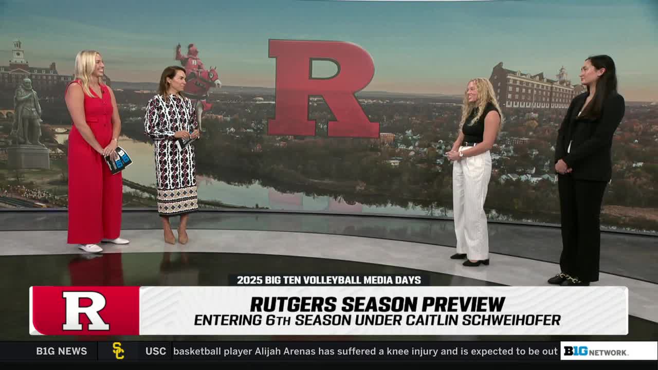 Four women stand in front of a backdrop featuring a large "R" and a cityscape, presumably on Big Ten Network. The screen displays a Rutgers volleyball season preview graphic.
