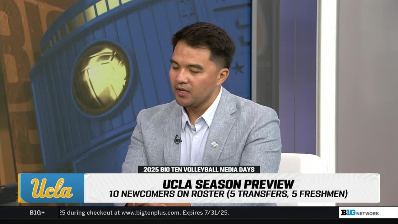 A man in a light gray jacket is speaking on the Big Ten Network. The screen displays a UCLA volleyball season preview, highlighting new players.
