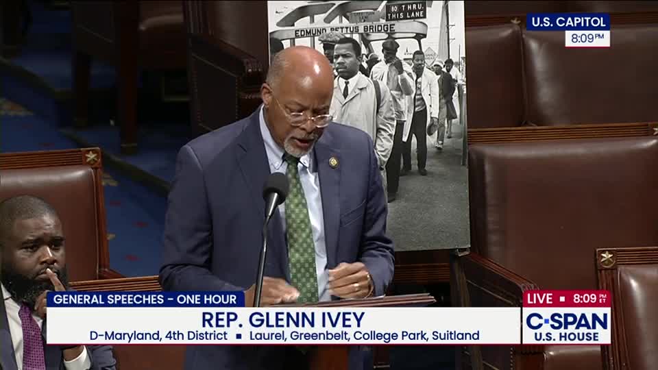Representative Glenn Ivey, speaking from a podium, gestures with his hands as he addresses the House. Behind him, a black-and-white photo of the Edmund Pettus Bridge is displayed, and the C-SPAN logo is visible at the bottom of the screen.
