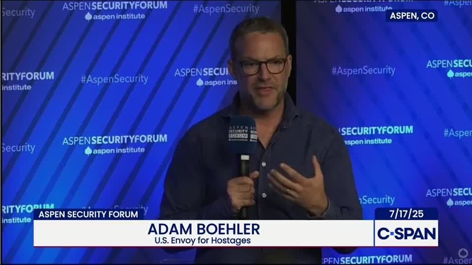 Adam Boehler, the U.S. Envoy for Hostages, speaks into a microphone at the Aspen Security Forum. His hands gesture as he talks, and the C-SPAN logo is visible in the lower right corner.
