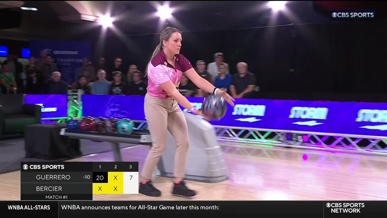 A bowler in a pink and maroon top is mid-delivery, the ball already released. The CBS Sports Network USA broadcast shows the score for the match.
