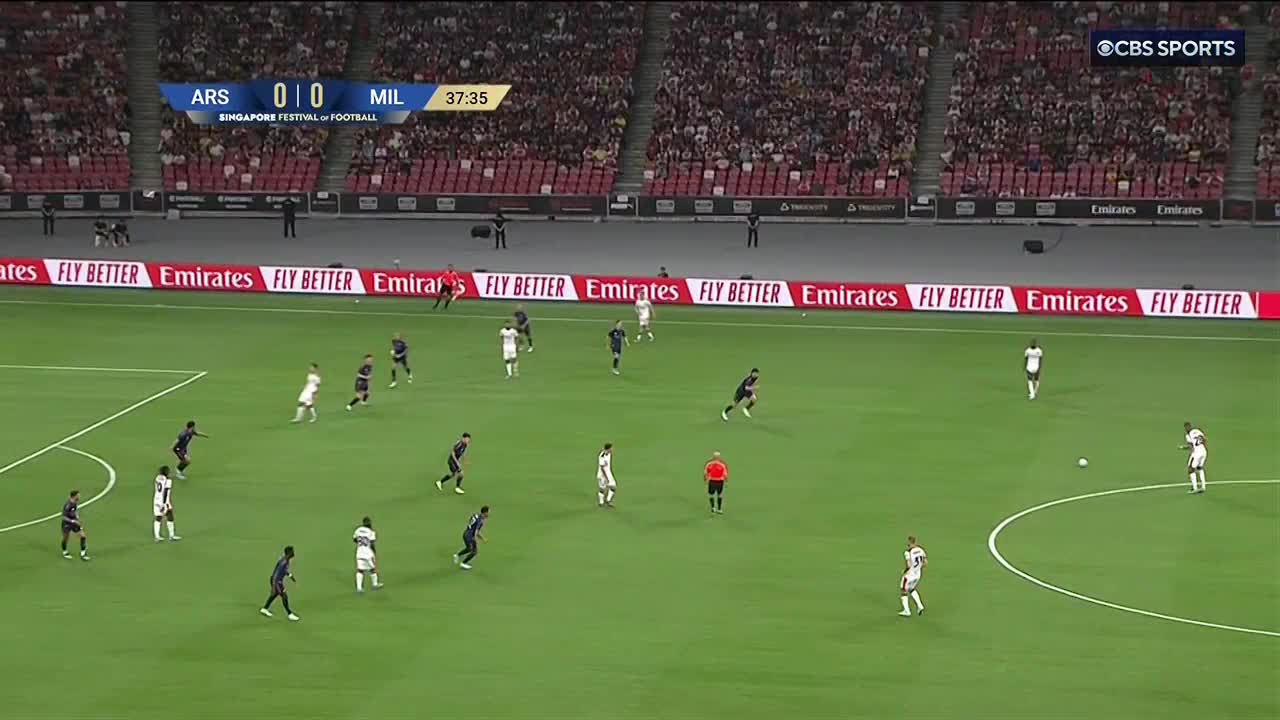 On the pitch, players in white and black uniforms are spread across the field, with the ball moving toward the right side of the screen. The CBS Sports Network USA logo is visible in the top right corner of the frame.
