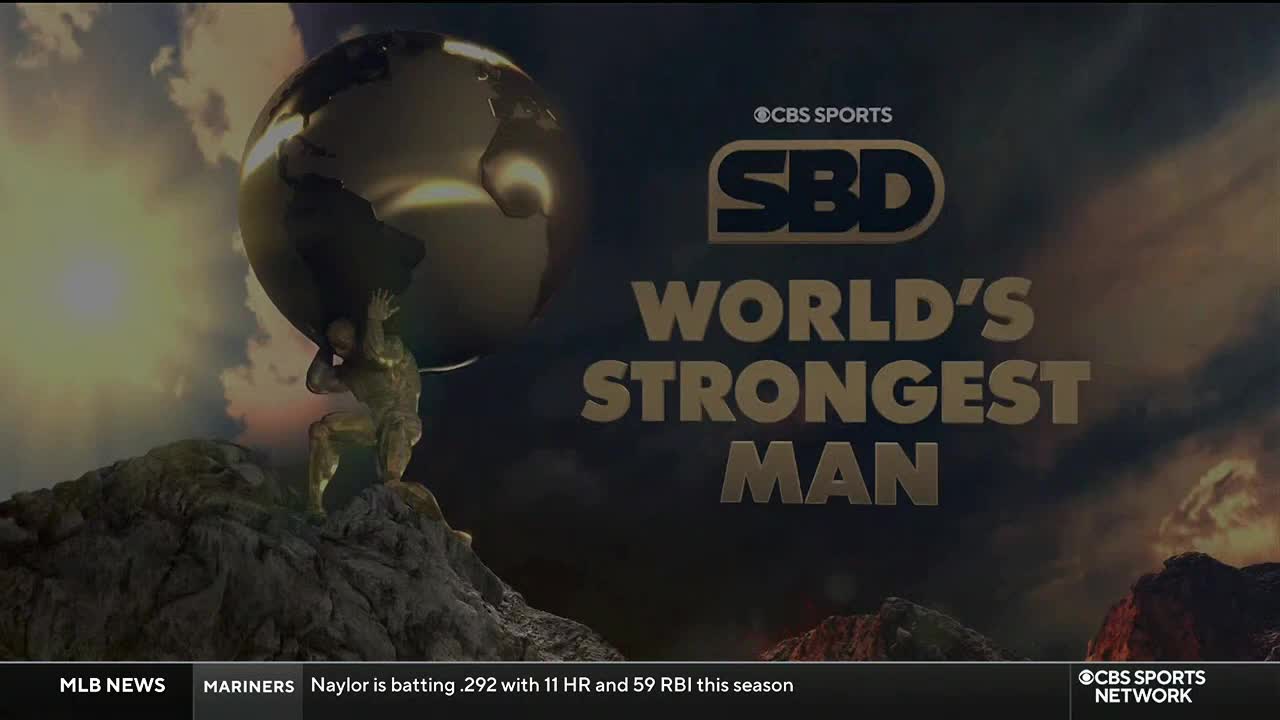 A golden statue strains to hold a globe aloft, the "World's Strongest Man" logo prominent above. The CBS Sports Network logo sits in the corner, with baseball news scrolling below.
