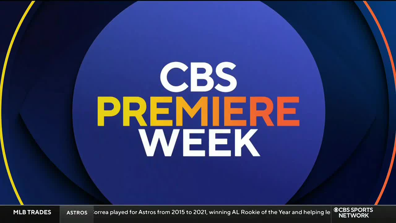 A CBS Sports Network graphic fills the screen, with "CBS PREMIERE WEEK" in bold white, yellow, and orange letters against a blue background. Below, a ticker mentions MLB trades and Astros news.
