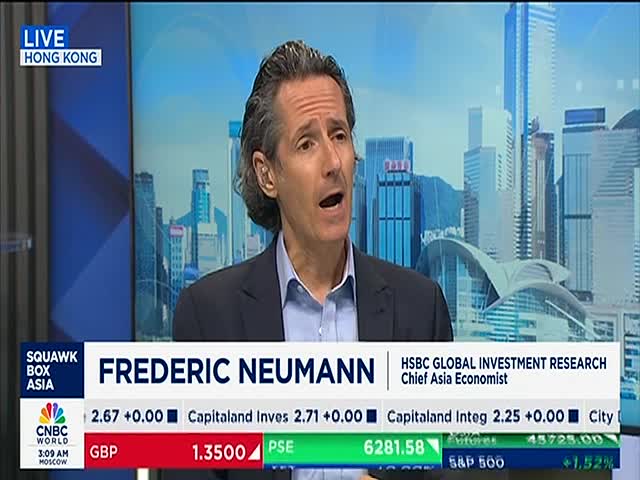 A man with graying hair is speaking, his mouth open as if mid-sentence, with a cityscape behind him. The CNBC World lower third identifies him as an economist.

