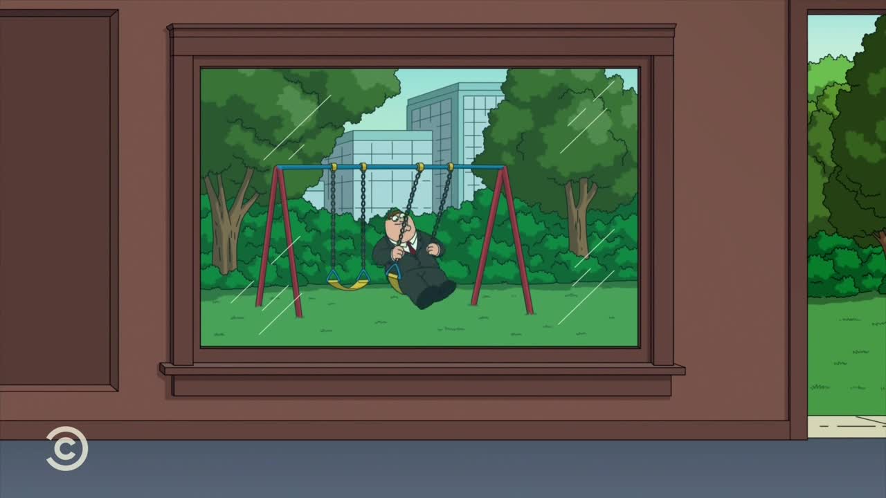 Through the window, a man in a suit is swinging on a playground swing set. Rain streaks the glass as he pumps his legs, the sky a pale gray behind him.
