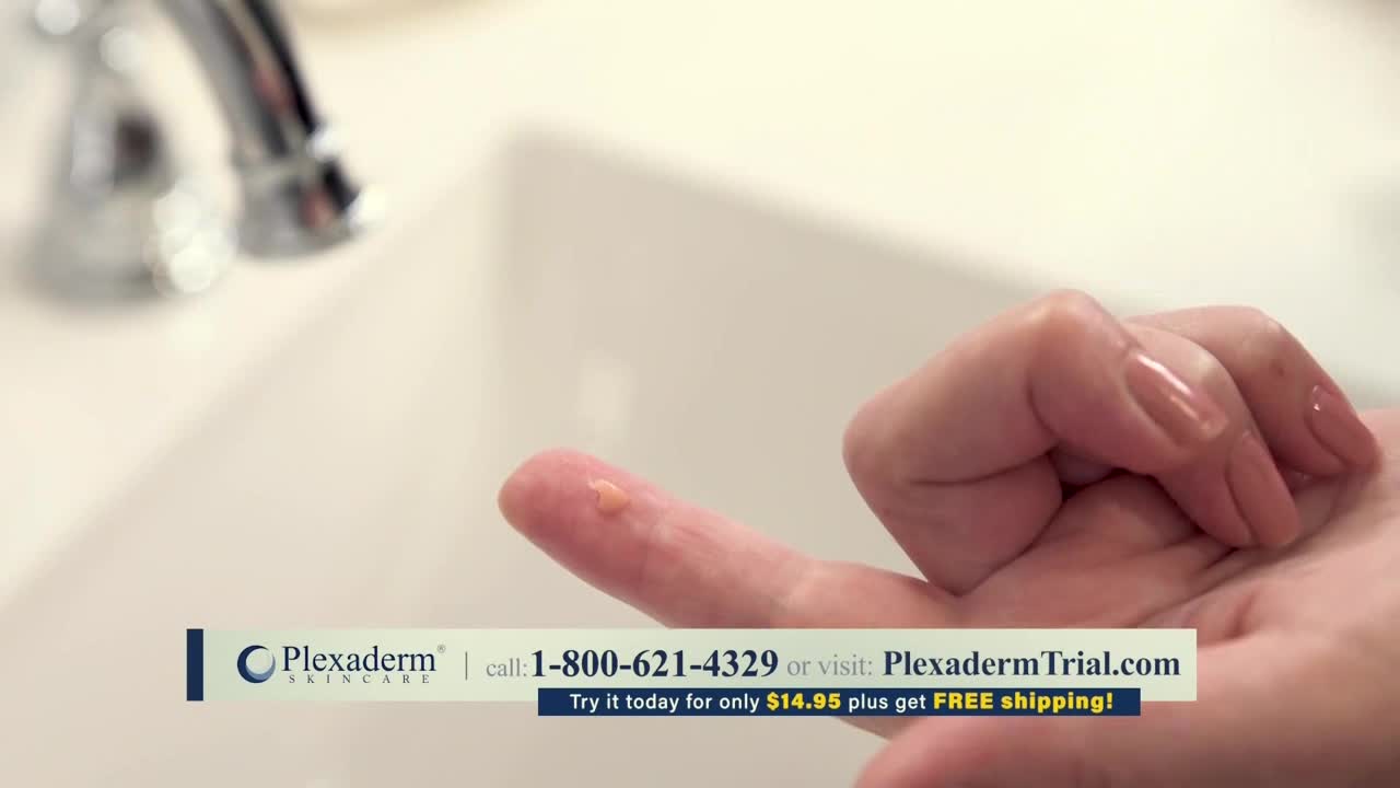 A dollop of cream sits on a finger, ready for application. The ad for Plexaderm, which aired on Comedy Central in the United States, is visible at the bottom of the screen.
