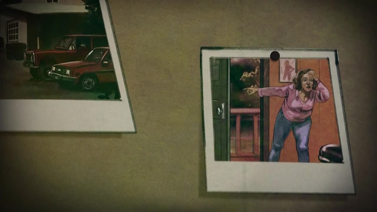 A woman in a pink shirt and jeans stands in a doorway, her face contorted in shock. A photo of two red cars sits next to the other, pinned to a wall.
