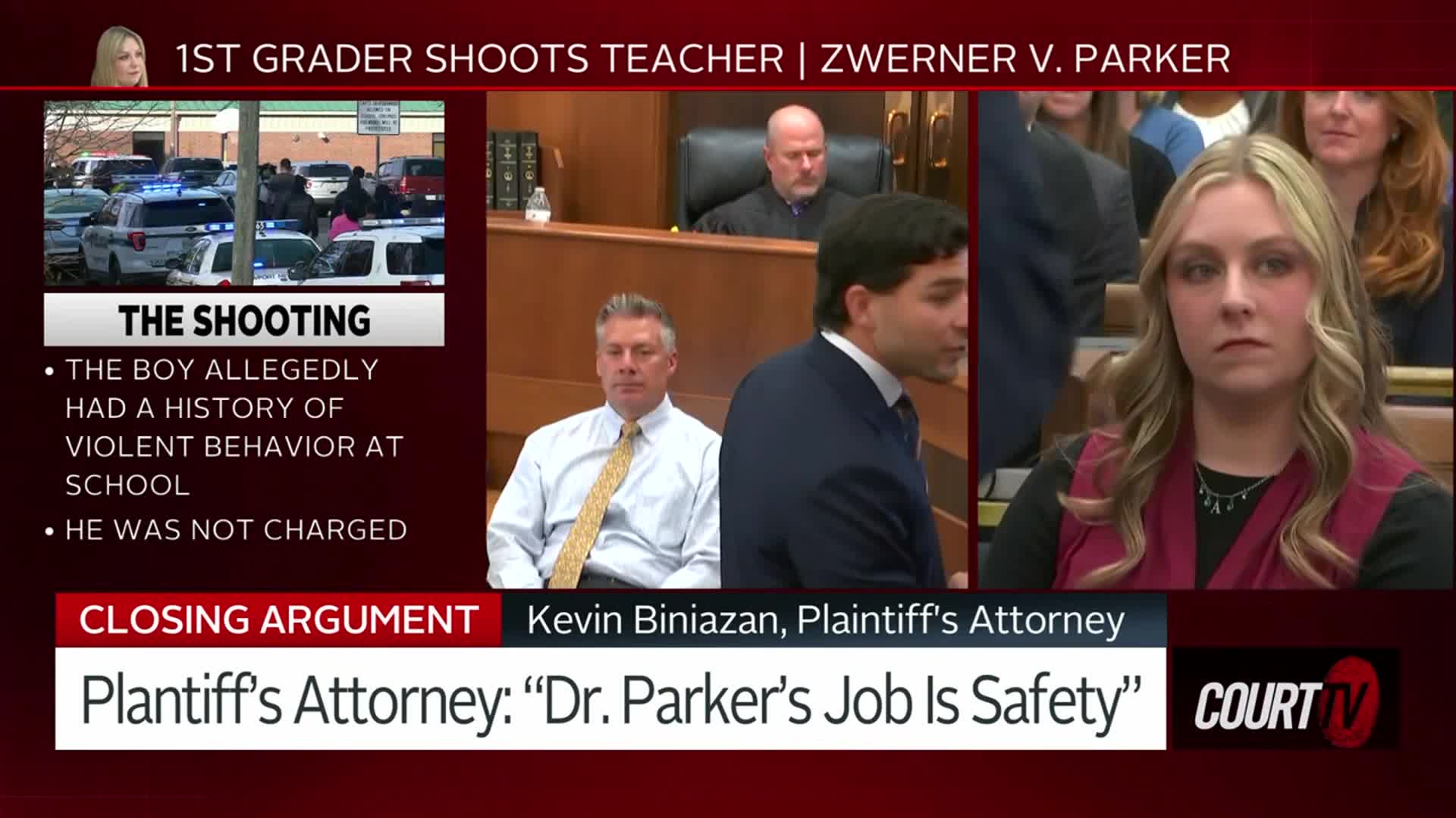 A man in a suit speaks, gesturing with his hands in a courtroom. Across the room, a woman with long blonde hair stares directly at the camera.
