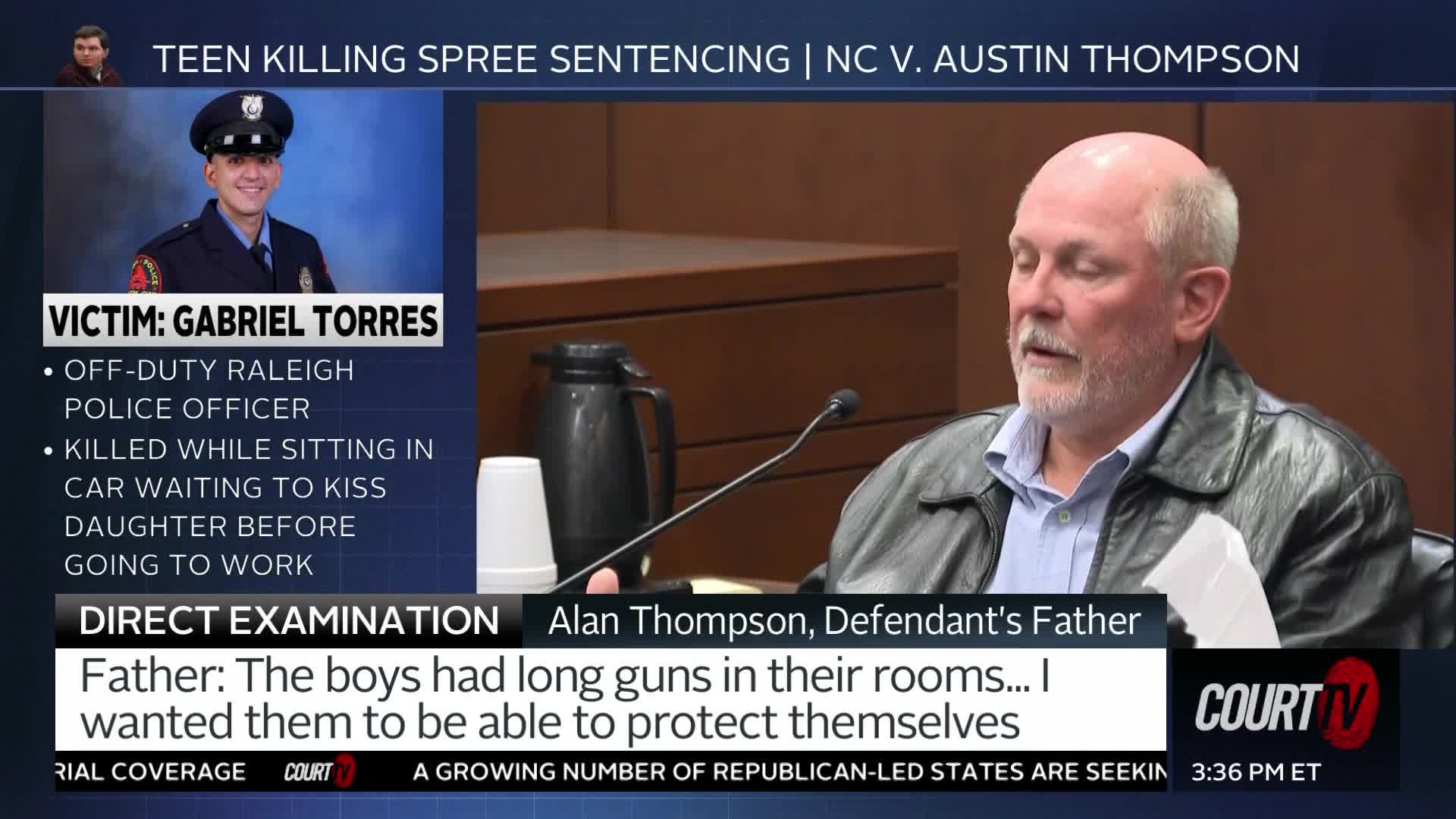 A man with a gray beard and a leather jacket speaks into a microphone. On a screen beside him, a photo shows a young police officer in uniform.