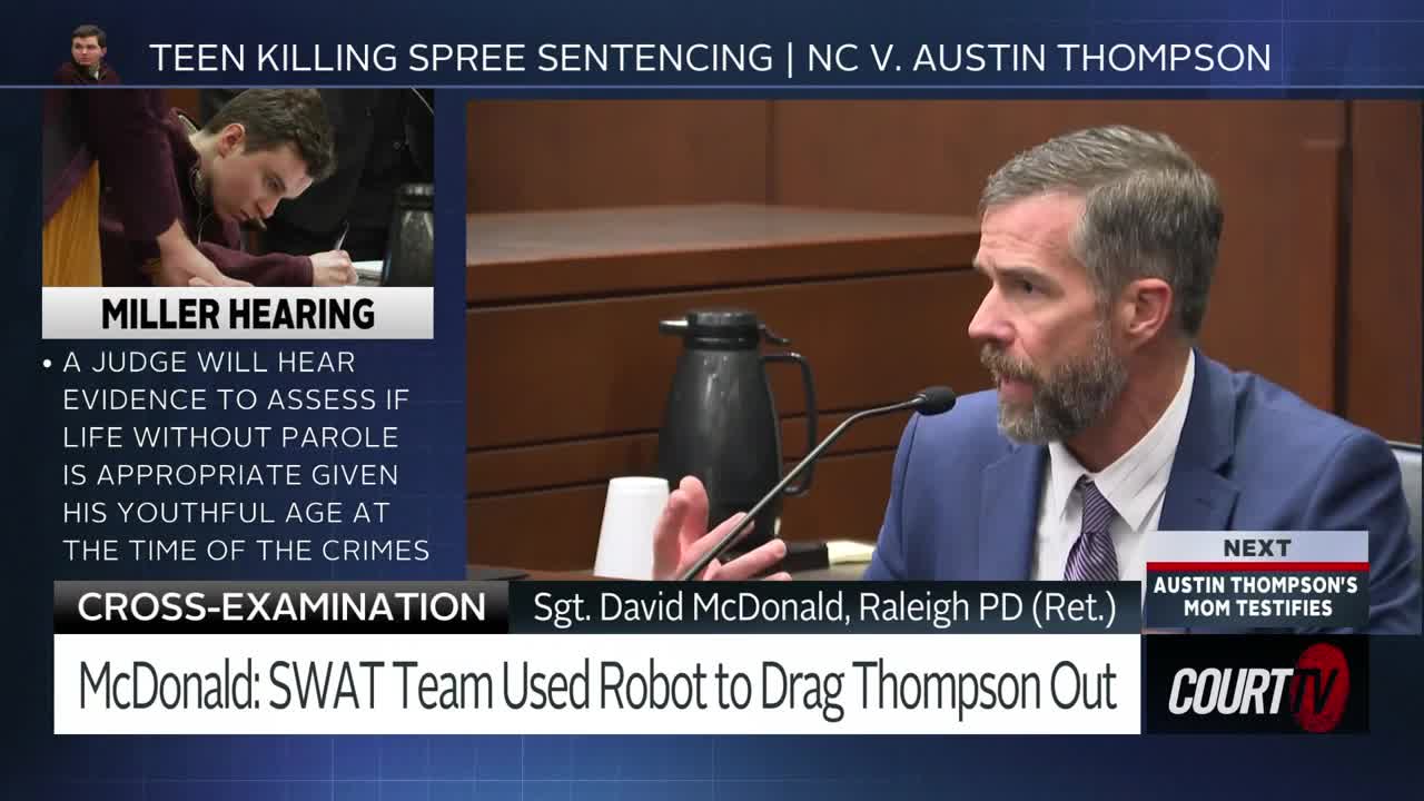 A man in a blue suit speaks into a microphone, his hand gesturing. A graphic on the screen indicates he is Sgt. David McDonald, retired from Raleigh PD, and he's being cross-examined.