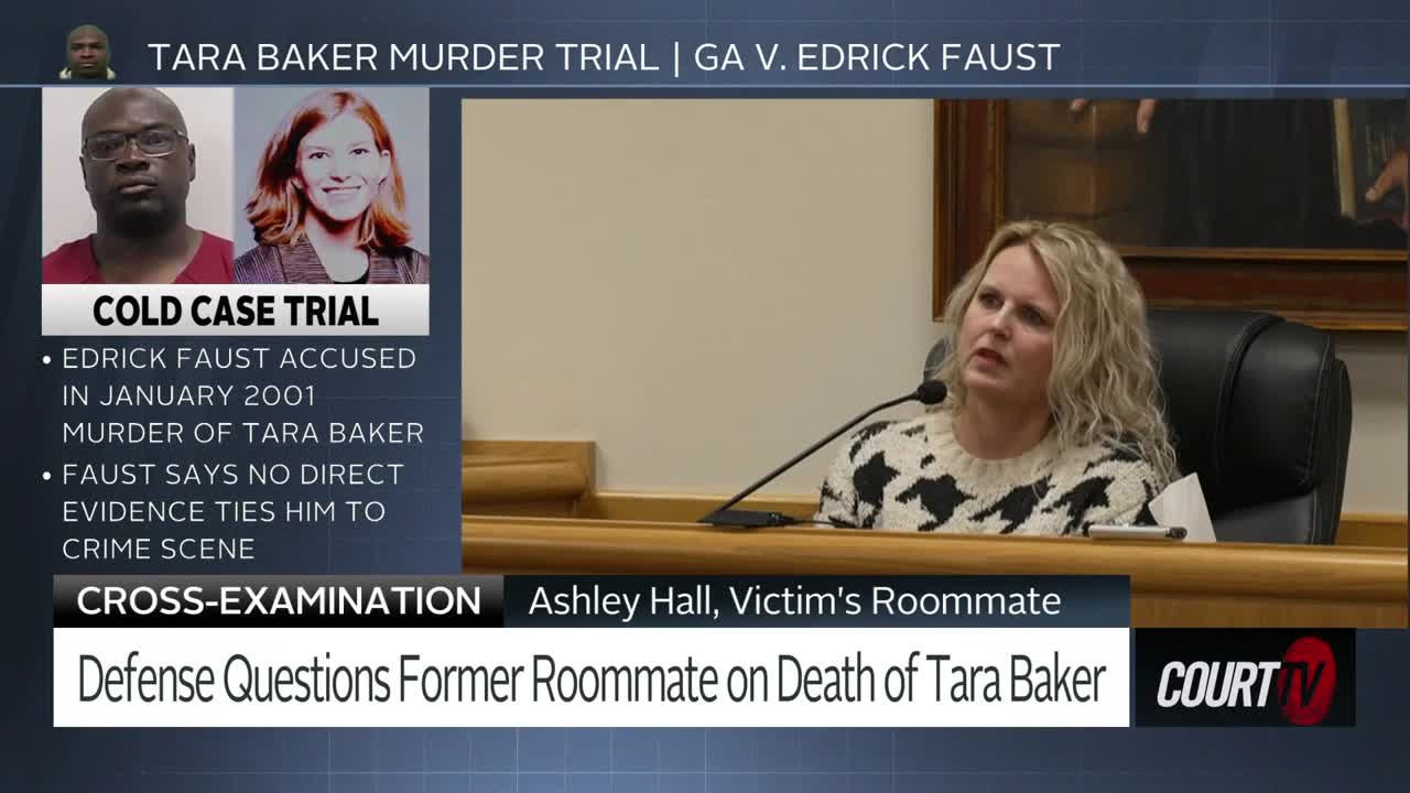 A woman with blonde, wavy hair speaks into a microphone at a wooden desk. The screen displays information about the Tara Baker murder trial.