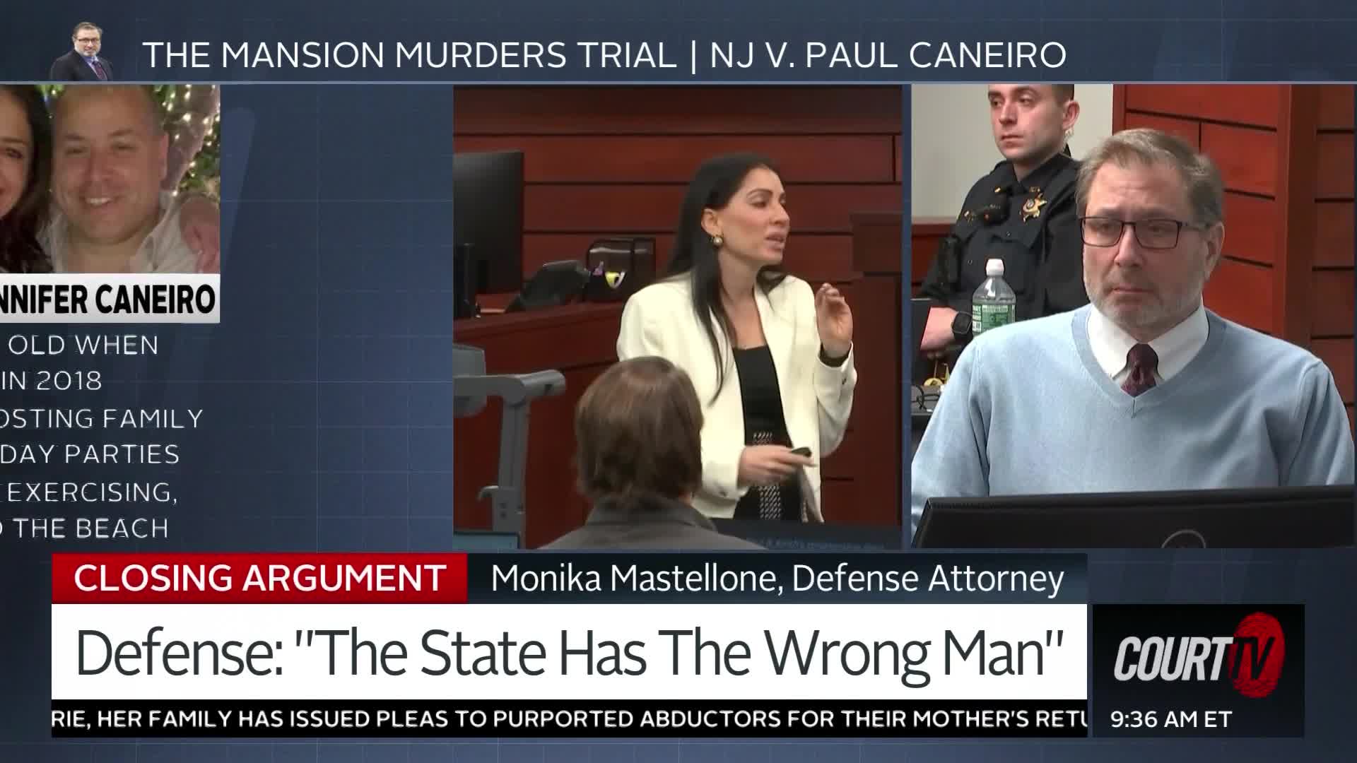 A defense attorney gestures emphatically as she speaks during closing arguments for the Mansion Murders Trial. Across the courtroom, the defendant, Paul Caneiro, sits with a neutral expression.