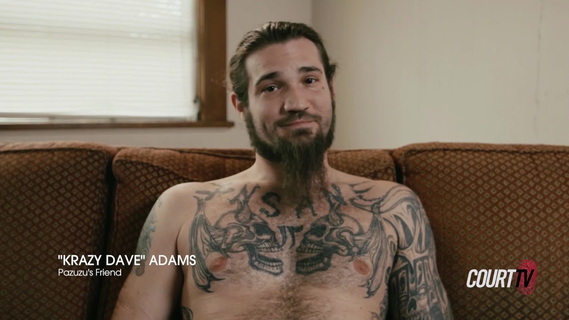 A man with a long goatee and extensive chest tattoos sits on a couch. The Court TV logo appears in the lower right corner.