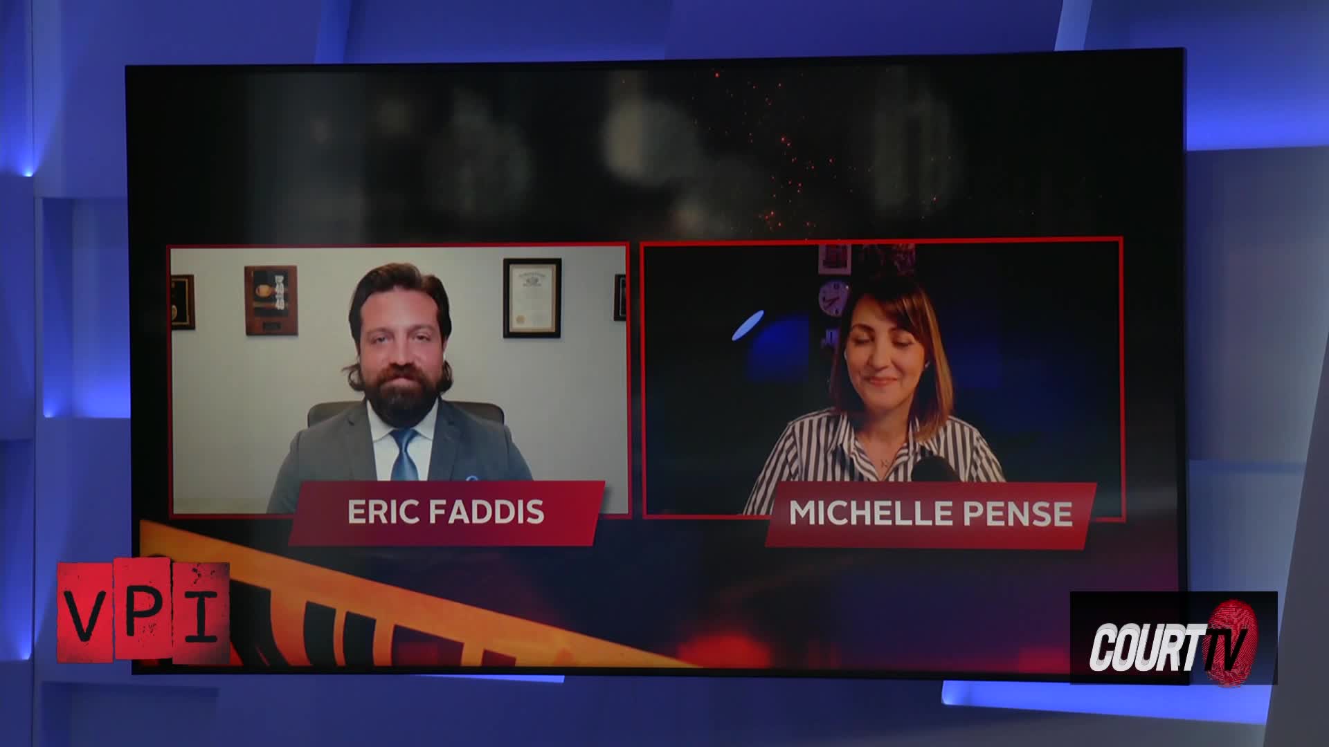 Eric Faddis, in a suit and tie, looks directly ahead from his screen. Michelle Pense smiles slightly, her gaze also fixed forward from her own window on the display.