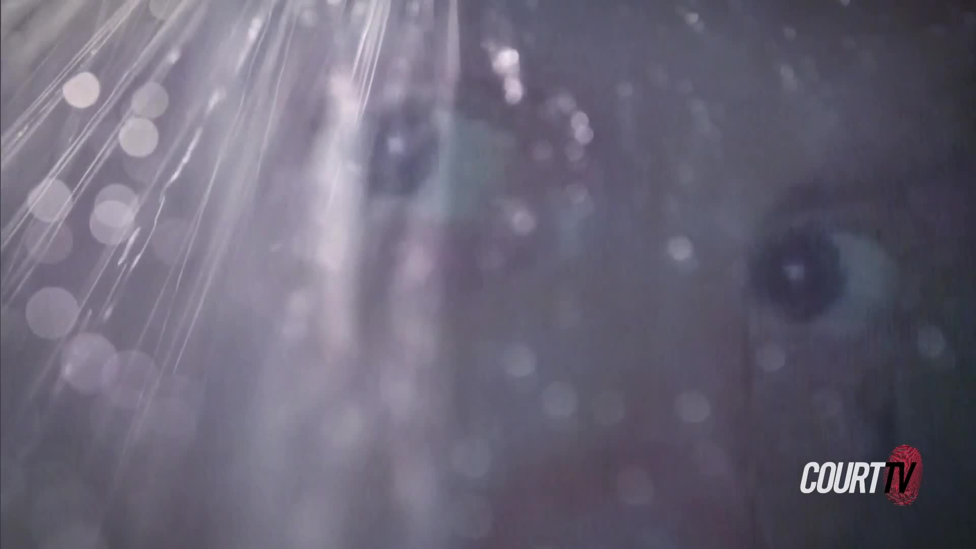 Water streams down, obscuring a person's face. The Court TV logo appears in the corner.