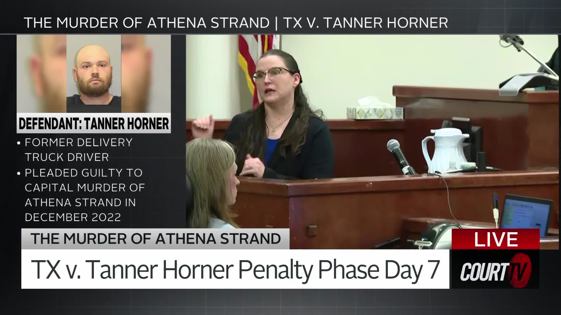 A woman in glasses gestures emphatically while speaking at a podium in a courtroom. Beside her, a person with blonde hair looks down, and a screen displays "TX v. Tanner Horner Penalty Phase Day 7."