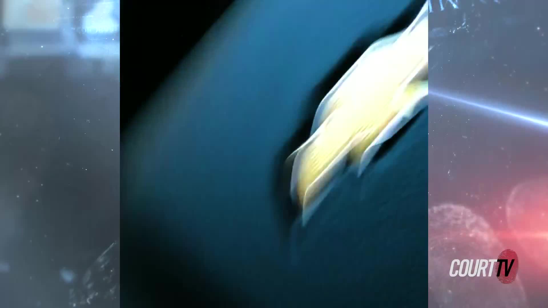 A white and yellow object streaks across a dark blue surface. Court TV's logo appears on the right side of the screen.