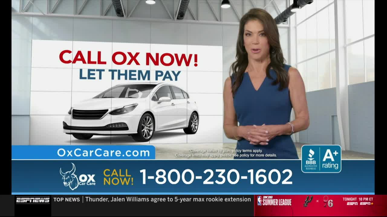 A woman in a blue dress stands beside a large image of a white car, promoting Ox Car Care. Below, the ESPNews ticker scrolls with sports updates.
