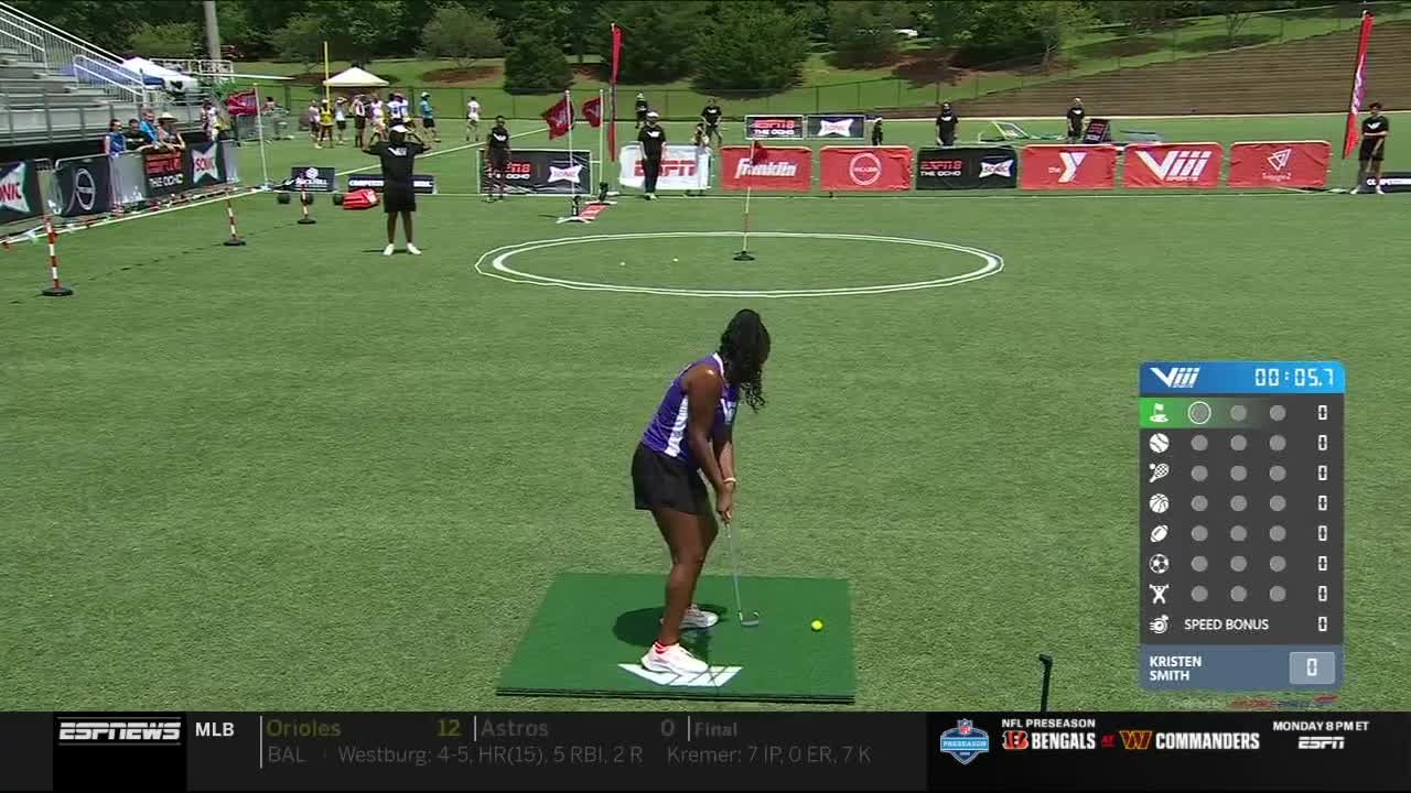 A woman in a purple shirt is lining up a putt on a green mat. The timer on the screen shows 00:05.7 as she prepares to swing.
