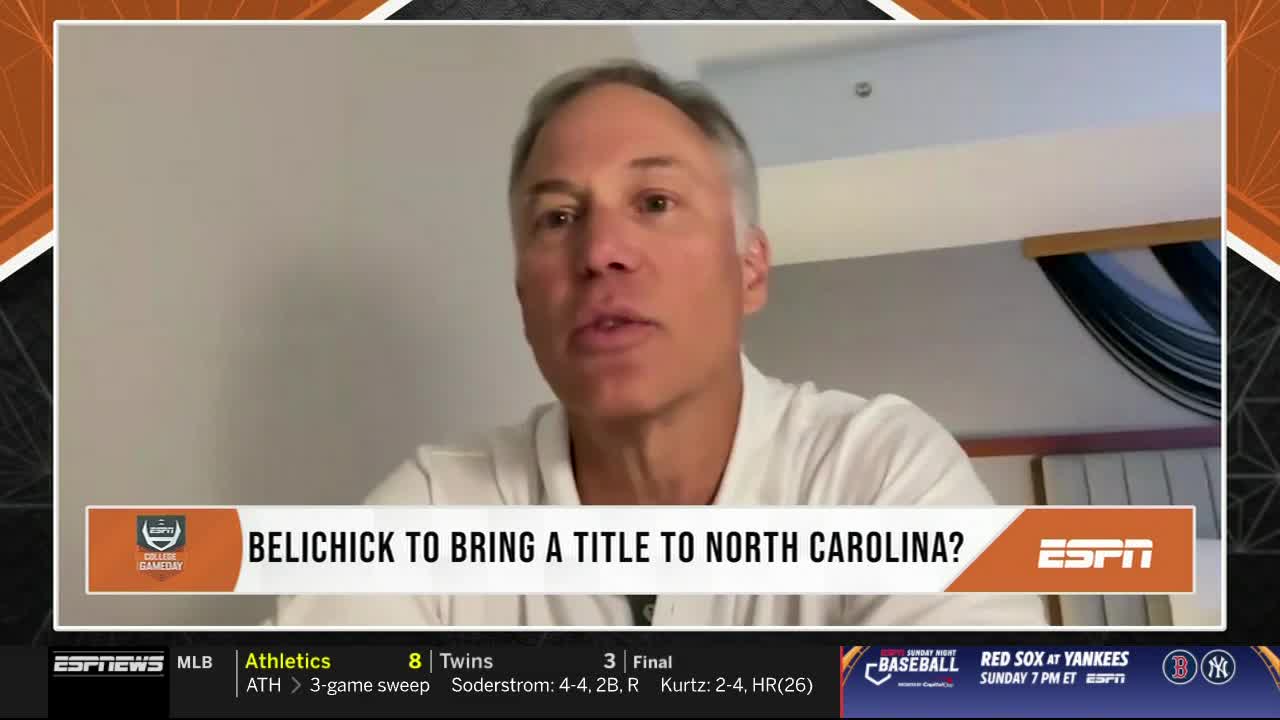 A man with graying hair is speaking, his face filling the screen on ESPNews. The lower third of the screen displays the question "Belichick to bring a title to North Carolina?"
