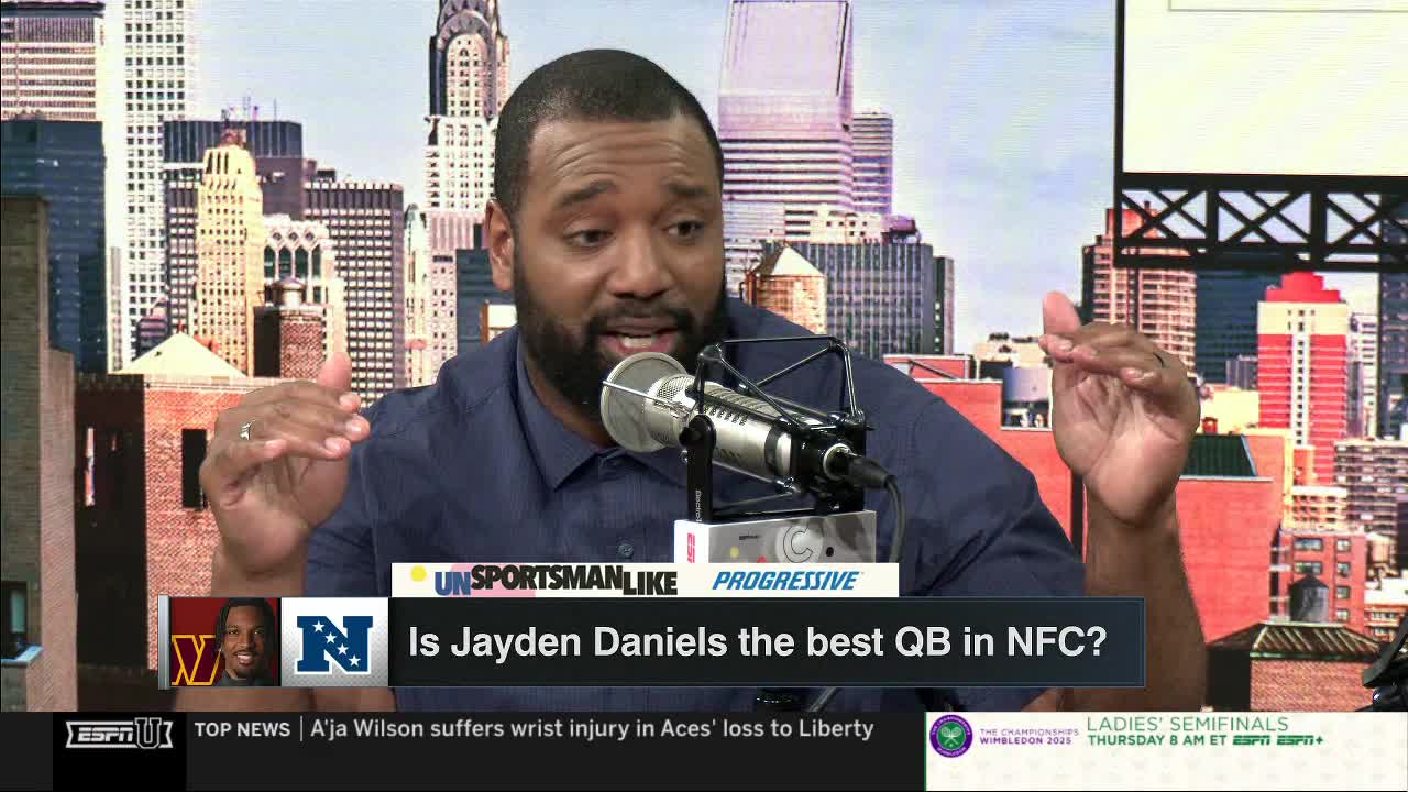 A man with a microphone gestures with both hands, talking animatedly. Behind him, a cityscape backdrop is visible, and the screen poses a question about an NFL quarterback.
