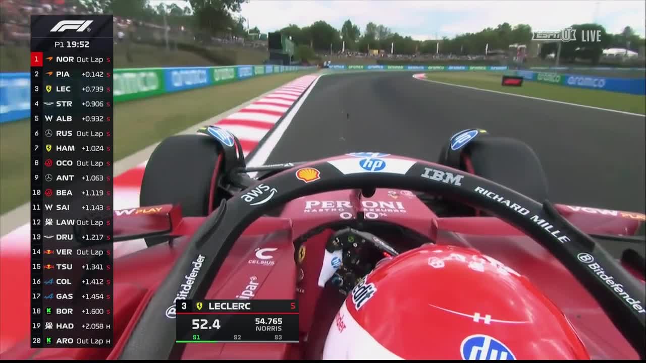 The red Ferrari, with Leclerc at the wheel, banks into a sweeping turn. The ESPNU broadcast shows the car's current lap time and the leaderboard, as the driver navigates the track.
