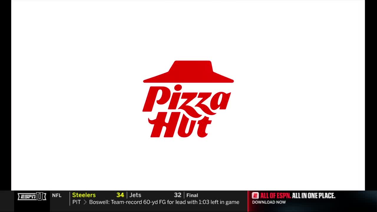 A red Pizza Hut logo sits centered on a white screen. Below, the ESPN ticker displays NFL game scores and a promo for "All of ESPN."
