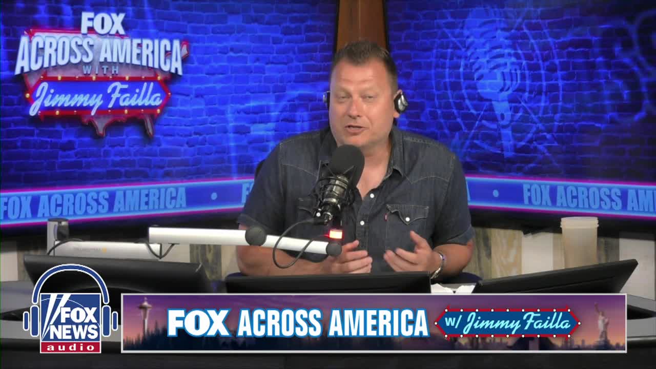 Jimmy Failla, on Fox News Radio's "Fox Across America," speaks into a microphone, gesturing with his hands. The background features a blue brick-like design and the show's logo.
