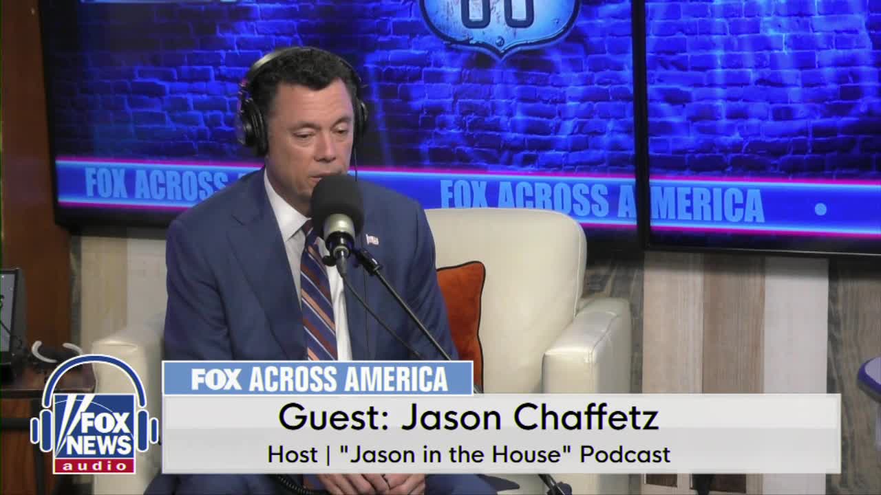 A man in a suit, wearing headphones, speaks into a microphone on a Fox News Radio set. The guest, Jason Chaffetz, sits in a cream-colored armchair, with a backdrop of a brick wall and the words "Fox Across America."
