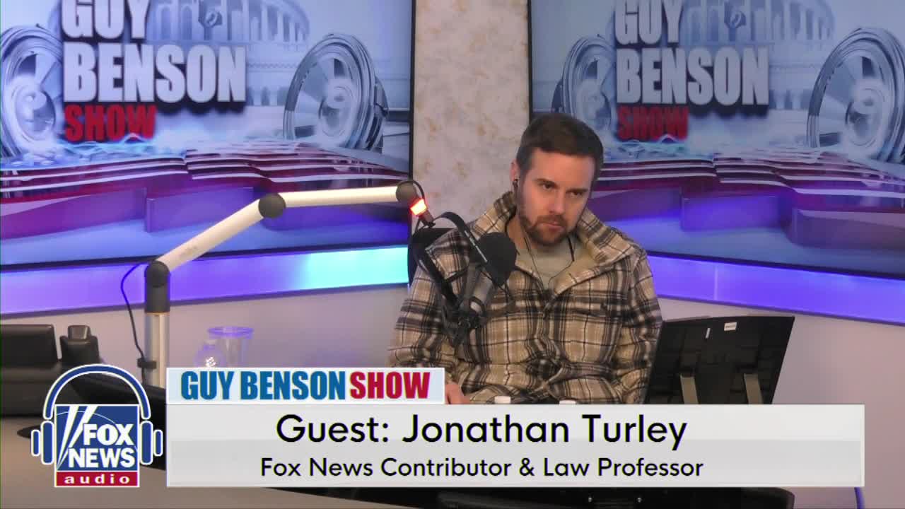 Jonathan Turley sits at a microphone, looking intently at something off-camera. A graphic identifies him as a Fox News contributor and law professor on "The Guy Benson Show."