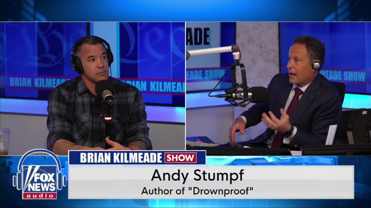 Brian Kilmeade sits with author Andy Stumpf, who gestures with his hands as he speaks into a microphone. The Fox News Radio logo is visible in the lower left corner.