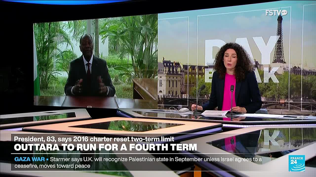 A news anchor with curly hair sits at a desk, speaking into a microphone. Behind her, a screen shows a man in a suit, likely President Ouattara, addressing the camera.

