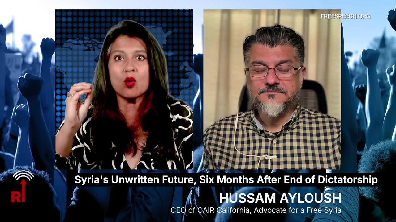 A woman on the left gestures with her hands, her mouth open as she speaks, while a man on the right listens intently. The Free Speech TV graphic at the bottom identifies the topic as Syria's future, six months after the end of dictatorship.
