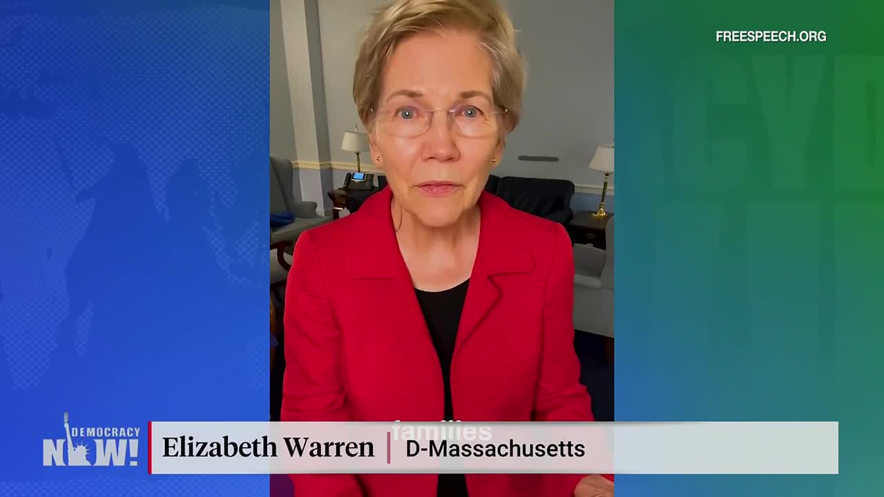 Elizabeth Warren, in a bright red jacket, is speaking directly to the camera, likely from a home or office setting. The Free Speech TV logo is visible in the corner, and a lower third identifies her as a Senator from Massachusetts.
