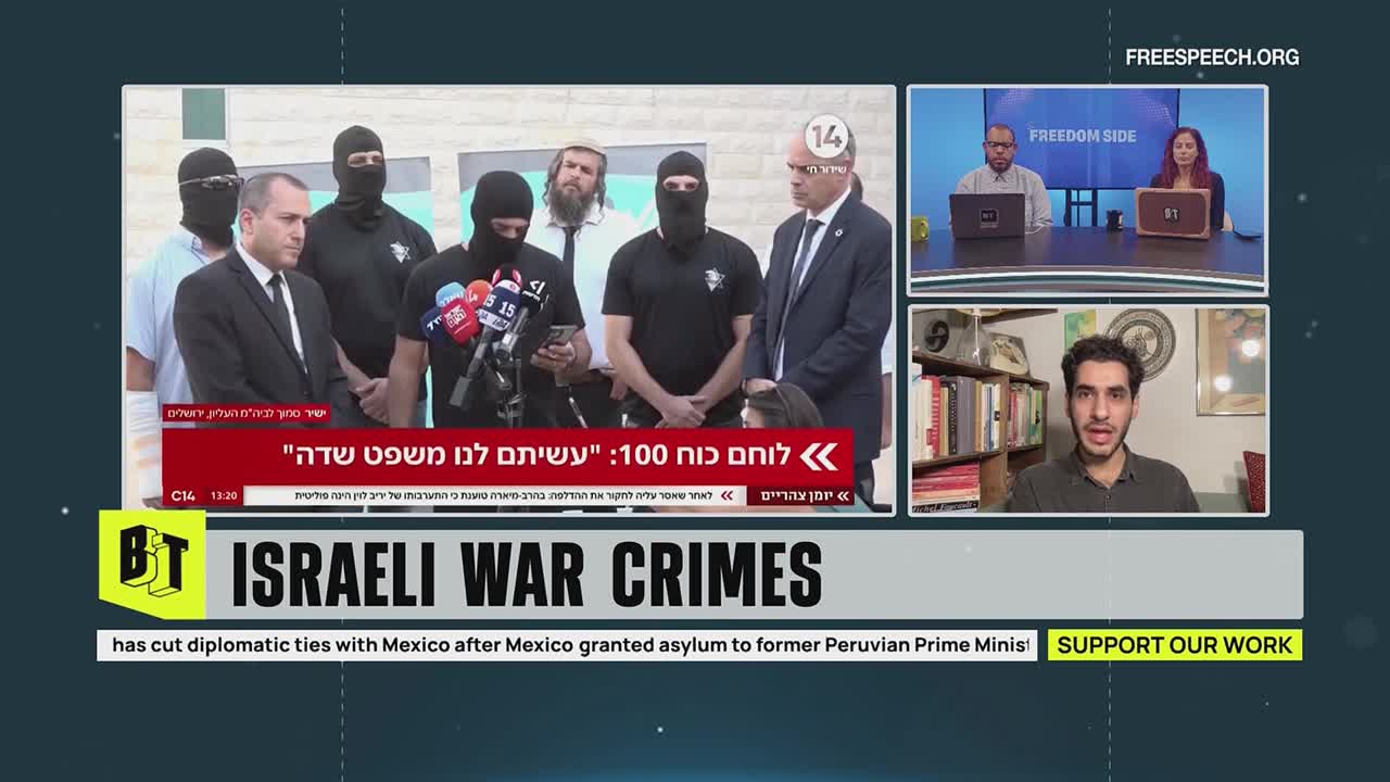 A news broadcast on Free Speech TV is showing a split screen. On one side, a group of men, some in black masks, stand near microphones, while on the other, commentators discuss the situation.
