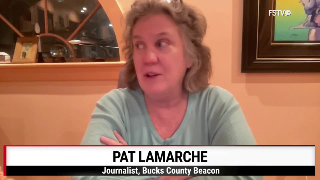 Pat LaMarche, a journalist, is speaking, her hands clasped in front of her. The Free Speech TV logo is visible in the corner.
