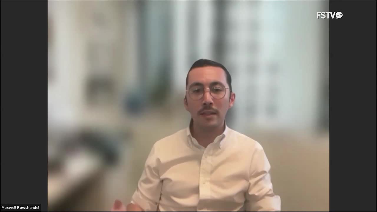 A man with glasses and a mustache speaks, gesturing with his hands. The FSTV logo appears in the upper right corner.