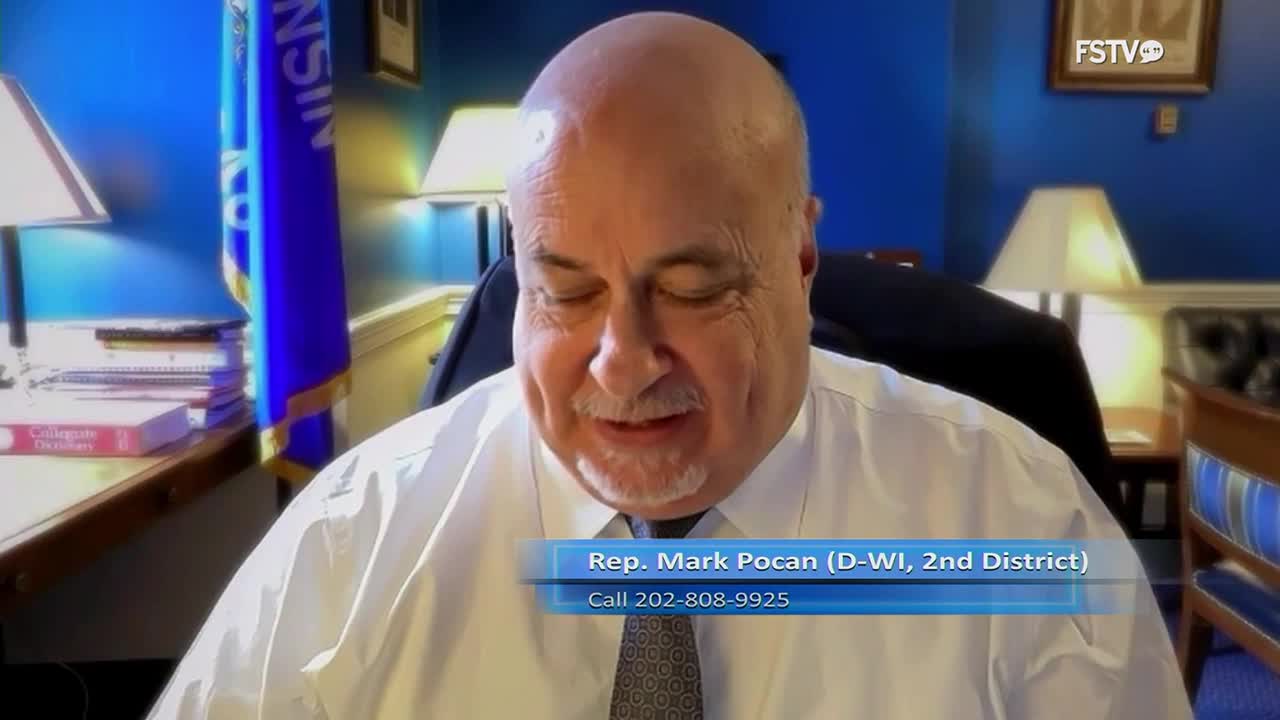 A man in a white shirt and tie leans forward, his eyes closed as if in thought. A blue flag with gold trim stands behind him, and a graphic identifies him as Rep. Mark Pocan.