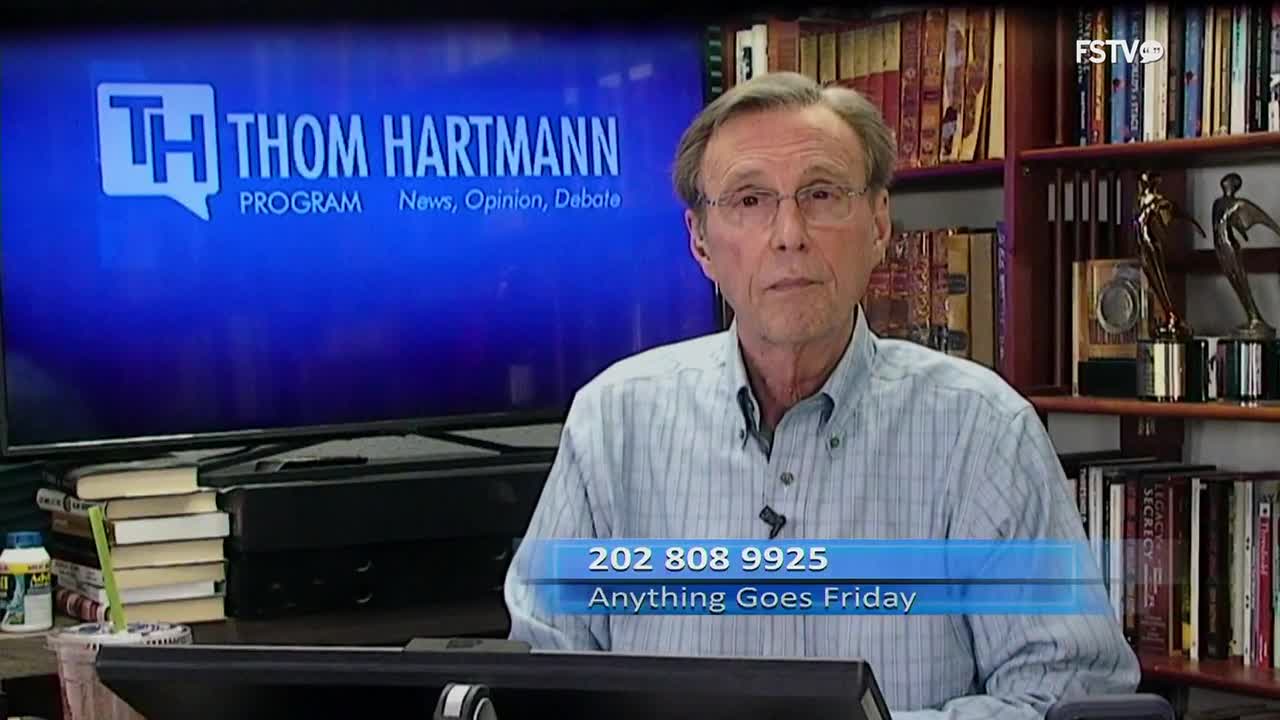 Thom Hartmann speaks directly to the camera, his program's logo behind him. A phone number and "Anything Goes Friday" appear on screen.