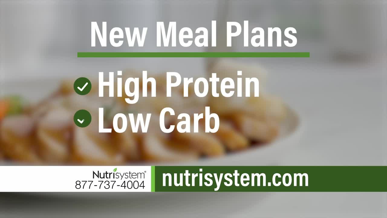 A plate of food is slightly out of focus behind text that reads "New Meal Plans." The ad highlights "High Protein" and "Low Carb" options, with a Nutrisystem logo and website address at the bottom.
