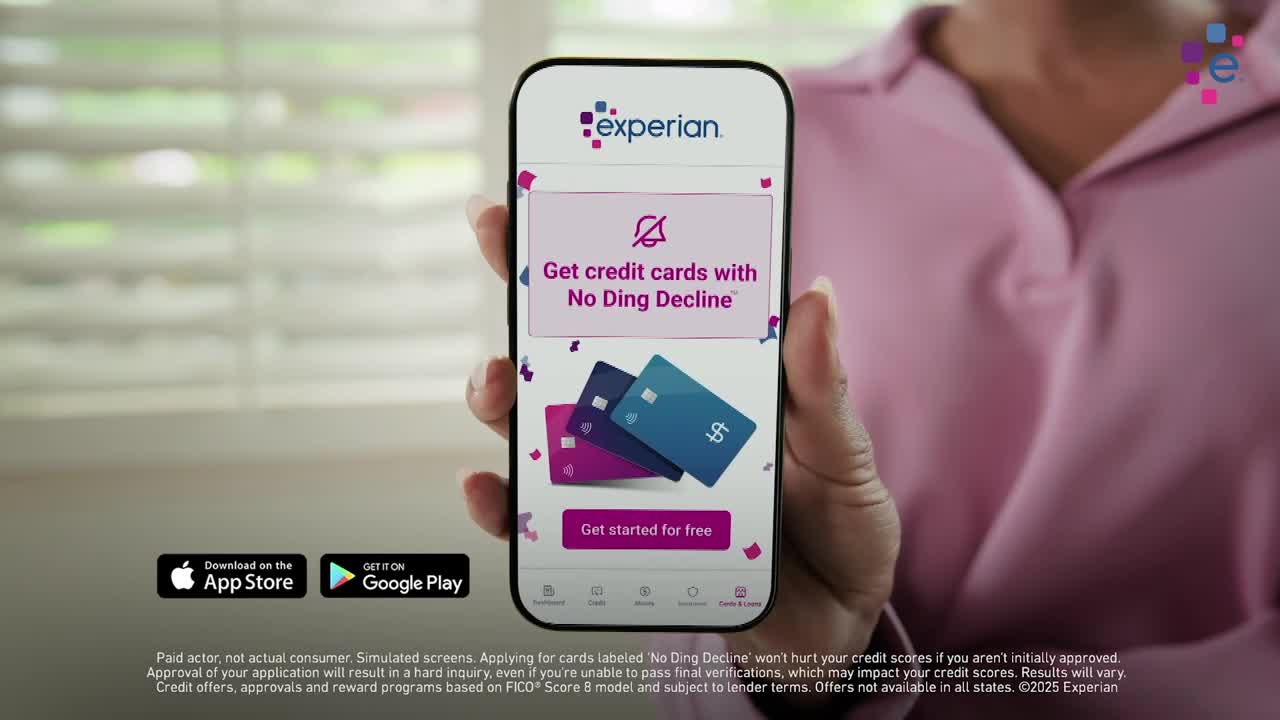 A hand holds up a smartphone displaying the Experian app. The screen advertises credit cards with "No Ding Decline" and shows three colorful credit cards.