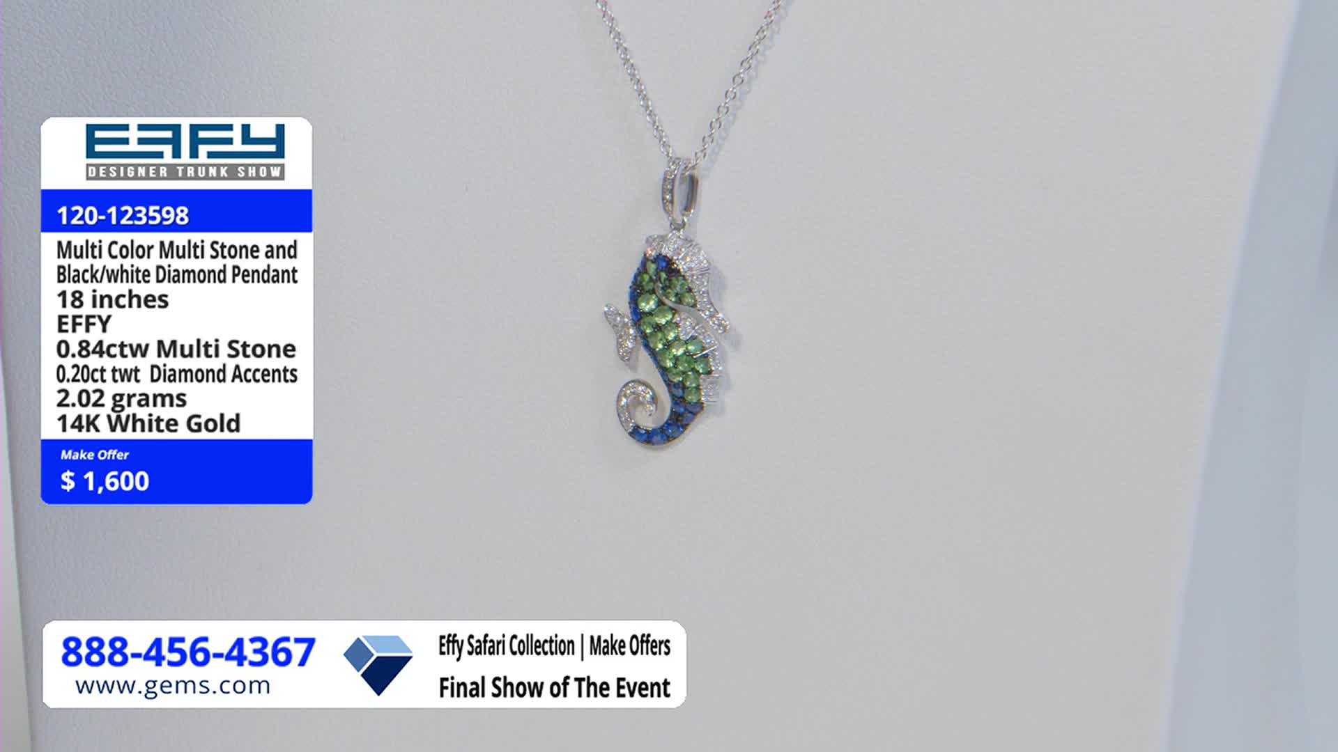 A seahorse pendant, sparkling with green, blue, and white stones, hangs against a white backdrop. The Gem Shopping Network logo and price tag are visible in the corner.
