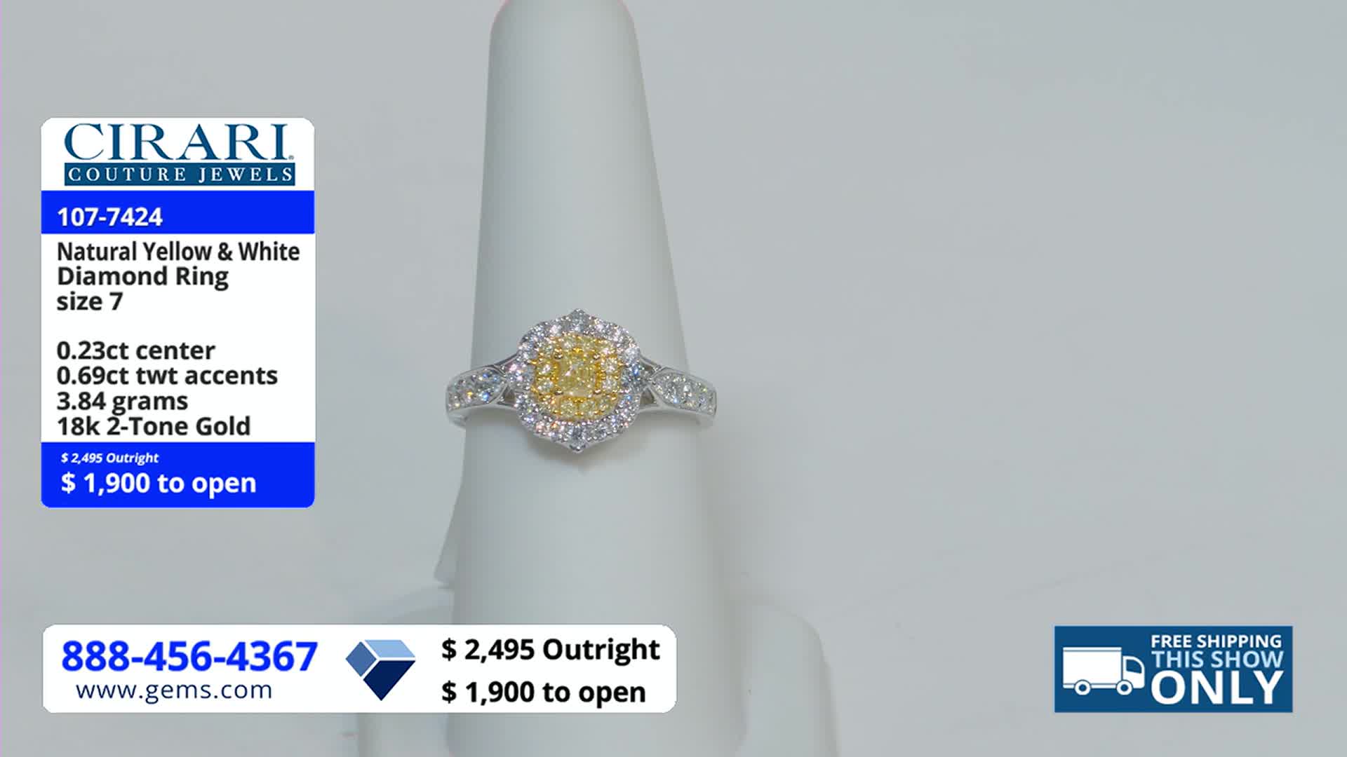 A ring with a cluster of yellow diamonds at its center sits on a white display. The Gem Shopping Network logo and details about the ring's features are visible on the left.
