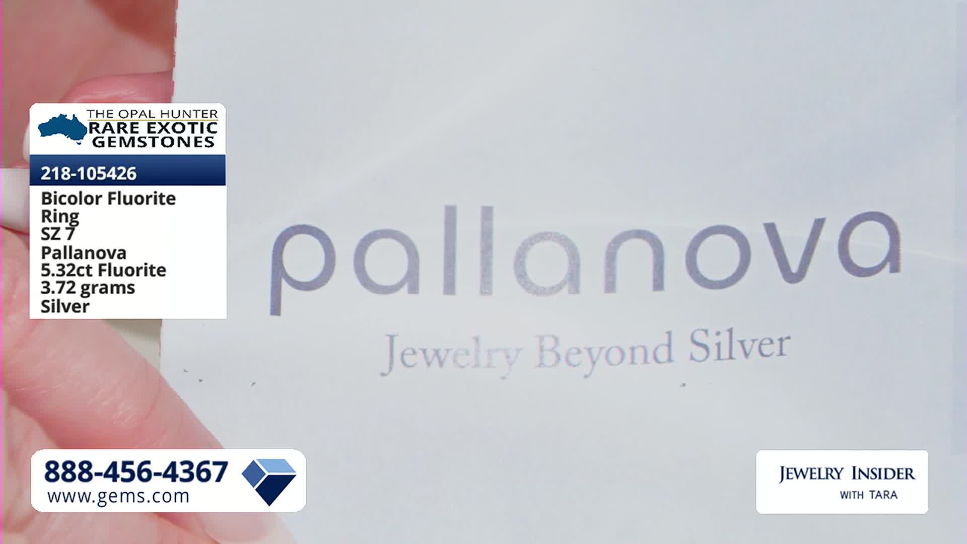A hand is holding up a card with details about a Bicolor Fluorite Ring. The background displays the "pallanova" logo with the tagline "Jewelry Beyond Silver."