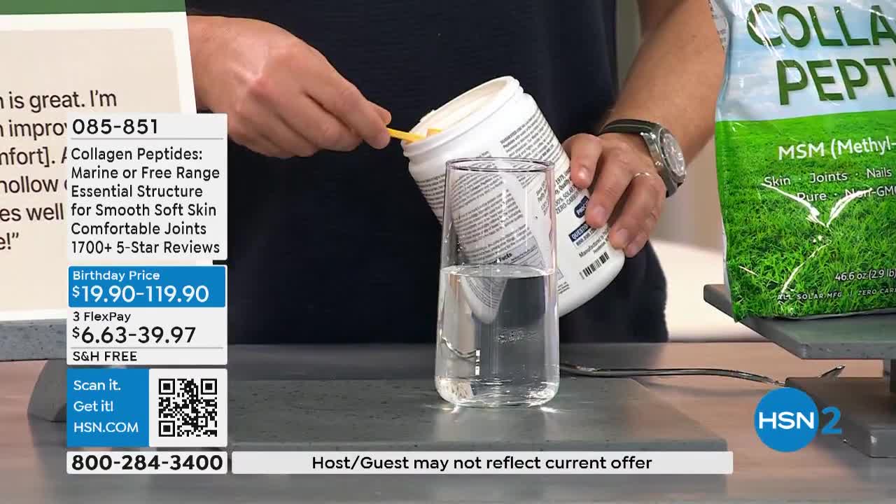 A man is pouring white powder from a container into a tall glass of water. The scene is set on a countertop, with a product bag and HSN2 branding visible.
