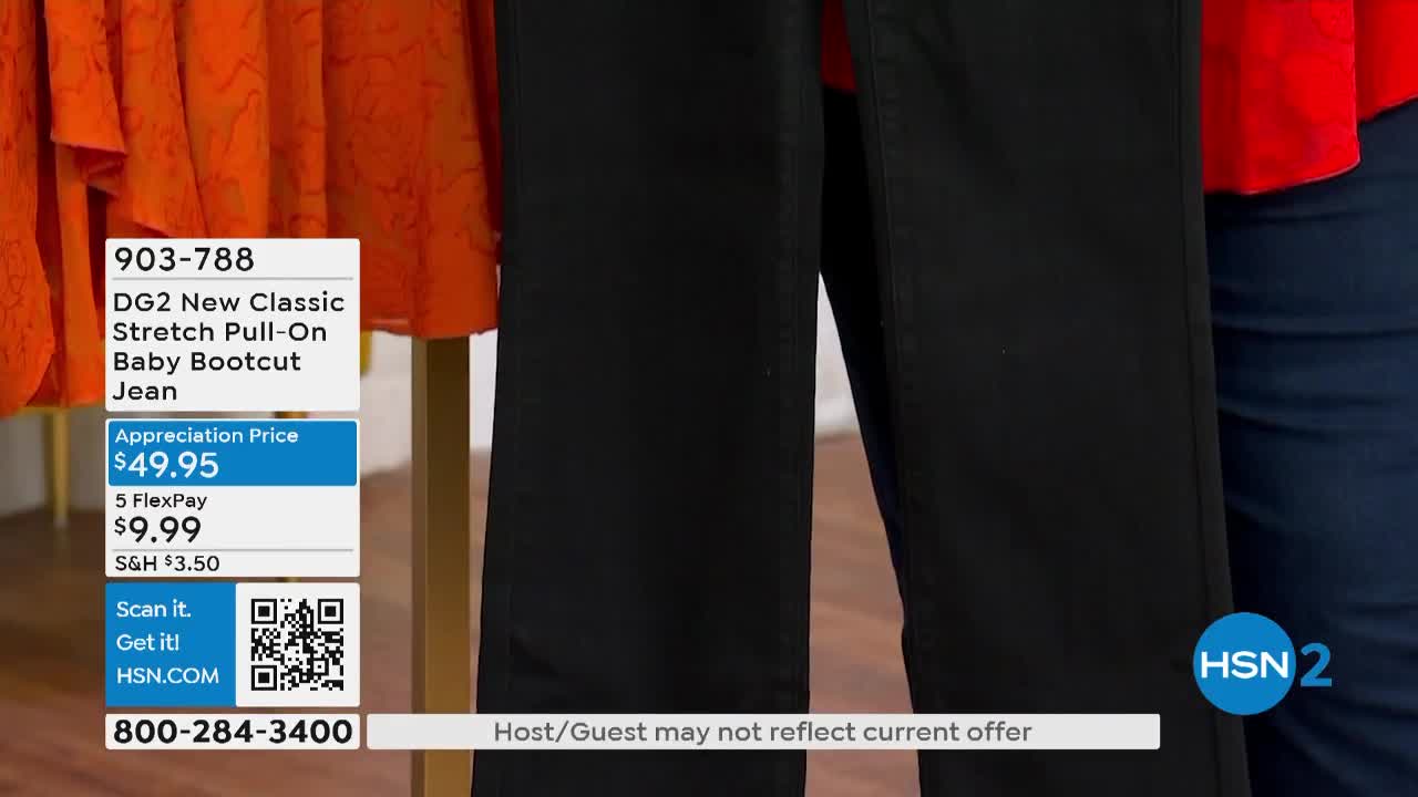 A person is holding up a pair of black jeans on the HSN2 set. The product details and price are displayed on a graphic next to the pants.
